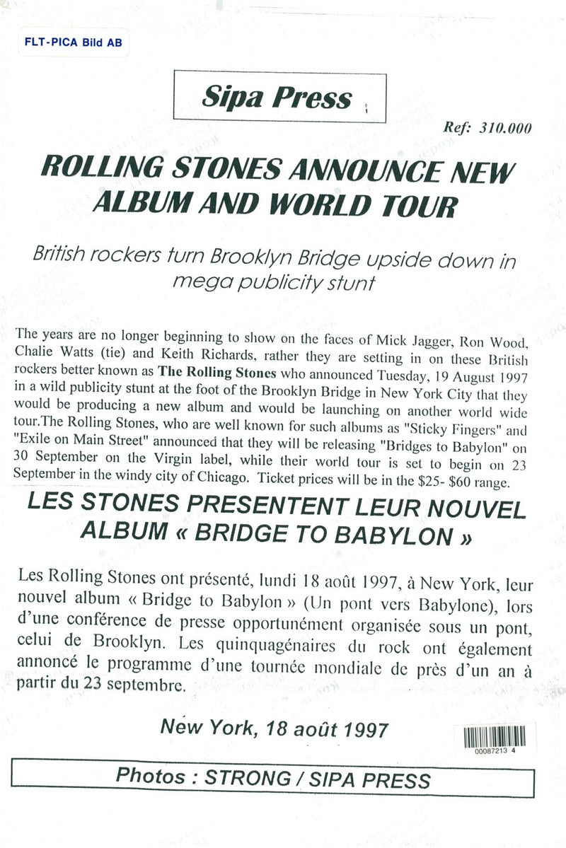 The Rolling Stones announces album release of Bridges to Babylon under the Brooklyn Bridge - Vintage Photograph