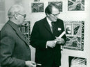 Artist Gerry Eckhardt discusses with Harry Martinson about paintings inspired by the poet&#39;s poetry during exhibition at the Artist&#39;s House - Vintage Photograph