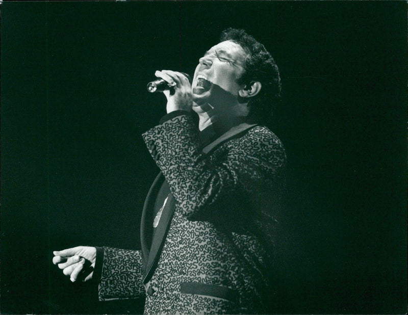 Tom Jones gave it all during the concert in Stockholm. - Vintage Photograph