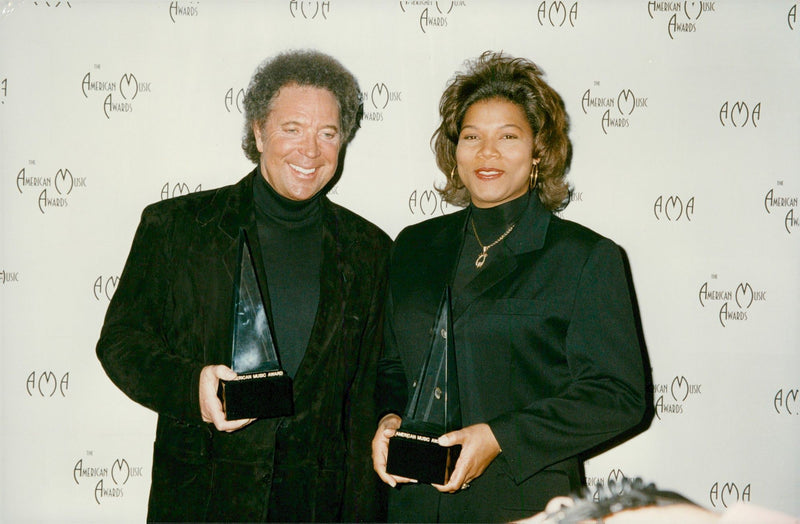 Tom Jones and Queen Latifah were both praised at the American Music Awards in 1994. - Vintage Photograph