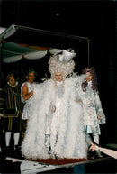 Elton John in a 19th century suit along with David Furnish at the ball on his 50th birthday - Vintage Photograph