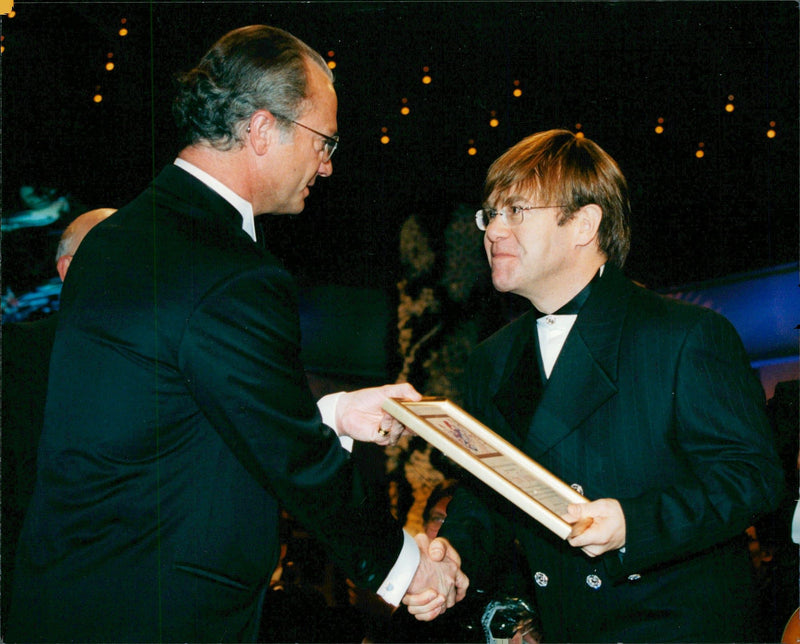 King Carl XVI Gustaf handed Polar Prize to Elton John at the Berwald Hall - Vintage Photograph