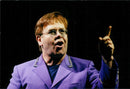 Elton John appears in the Globe during his European Tour. - Vintage Photograph