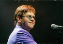 Elton John appears in the Globe during his European Tour. - Vintage Photograph