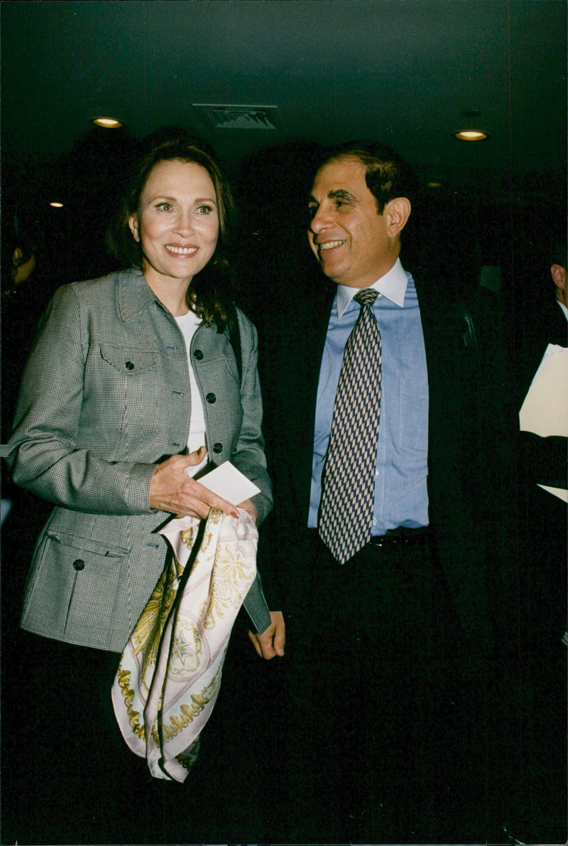 Faye Dunaway along with Gary Guttman during the premiere of Dinah Washingtons musical. - Vintage Photograph
