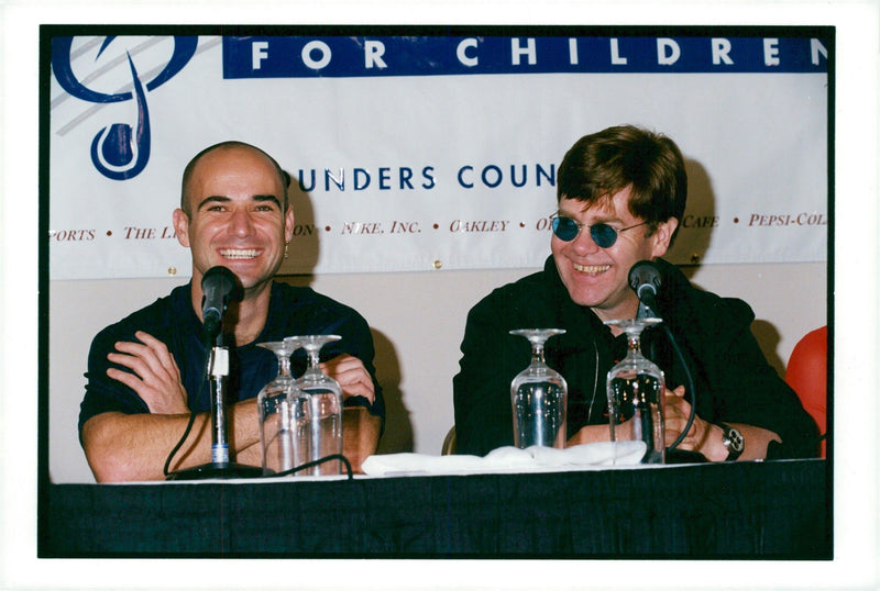 Andre Agassi and Elton John during a press conference in Las Vegas - Vintage Photograph