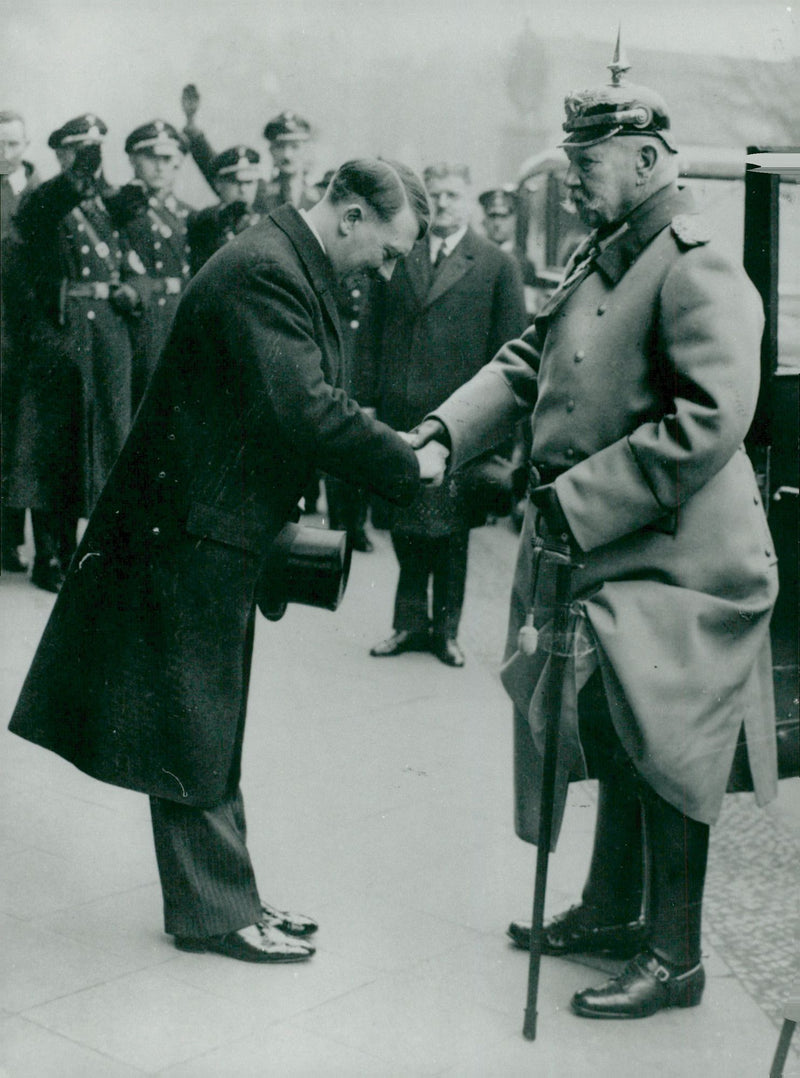 Adolf Hitler greets the president of the Hindenburg National Council. - Vintage Photograph