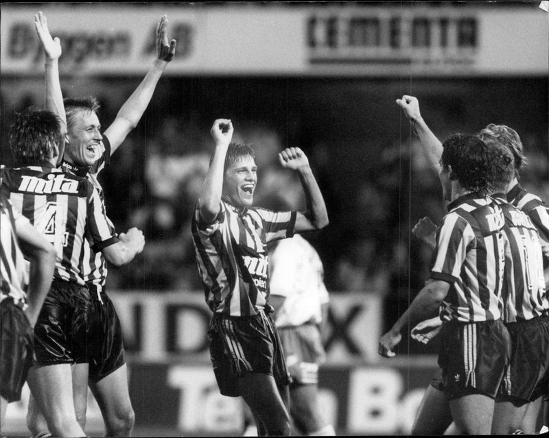 Genuine DjurgÃ¥rds delight after 9-1. Jens FjellstrÃ¶m conducts the celebration in the center of the picture - Vintage Photograph