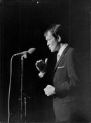 Jan Lindblad mimics birds at a Christmas concert - Vintage Photograph