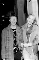 Mick Jagger with the photo model Jerry Hall after a Japanese dinner in Paris - Vintage Photograph