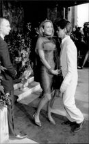 Mick Jagger celebrates with the photo model Jerry Hall - Vintage Photograph