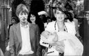 Mick Jagger with the model Jerry Hall to rename their daughter in the Church of St Mary Abbots - Vintage Photograph