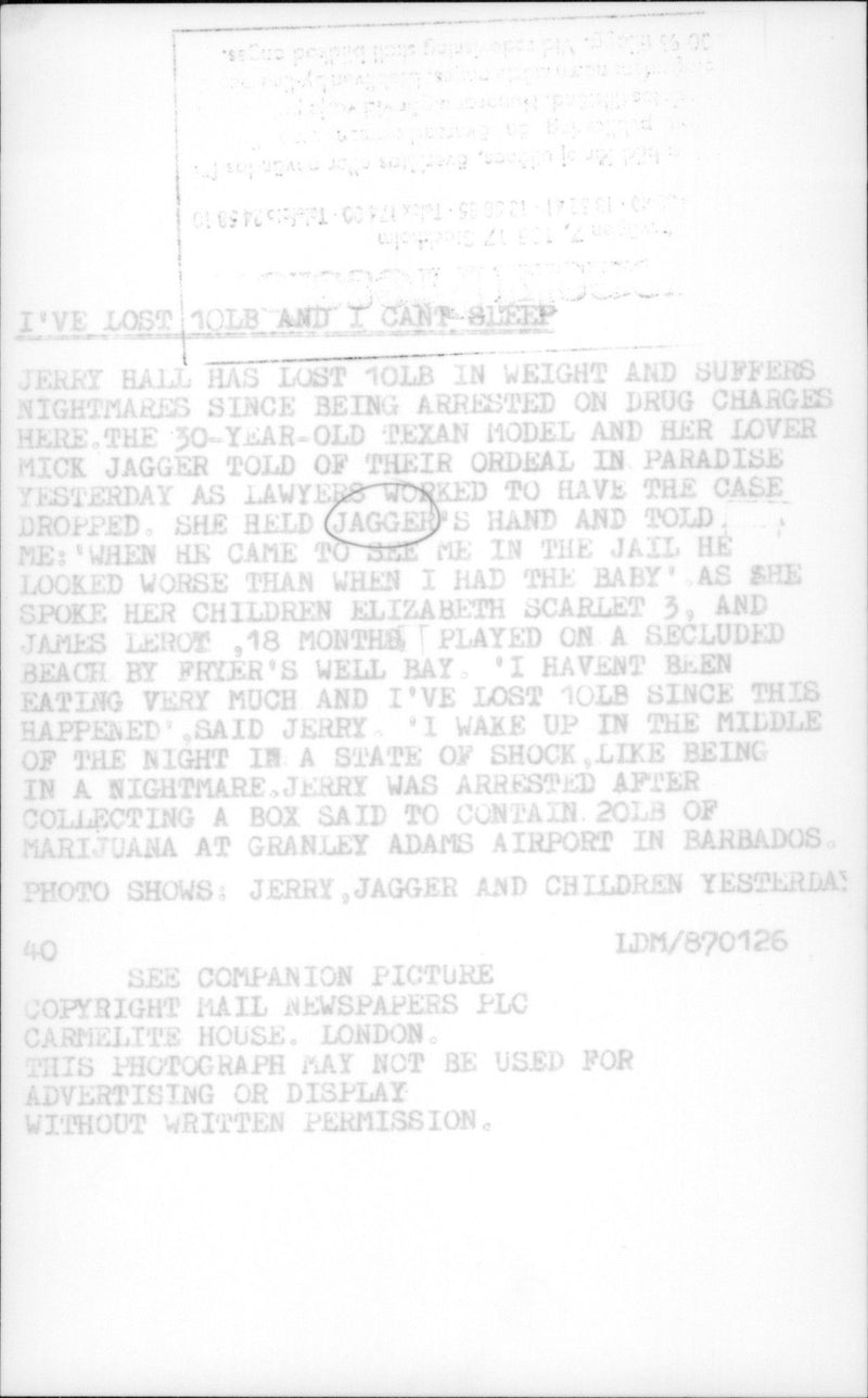 Mick Jagger and the model Jerry Hall with their children Elizabeth Scarlet and James Leroy on the beach at Fryers Well - Vintage Photograph