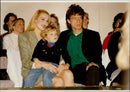 Mick Jagger and the model model Jerry Hall as well as their son James Leroy at Mick&#39;s daughter Elizabeth Scarlet&#39;s first fashion show at Park Lane Hotel - Vintage Photograph