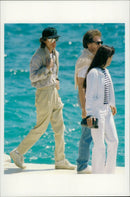 Mick Jagger leaves Eden Roc Hotel with some friends - Vintage Photograph