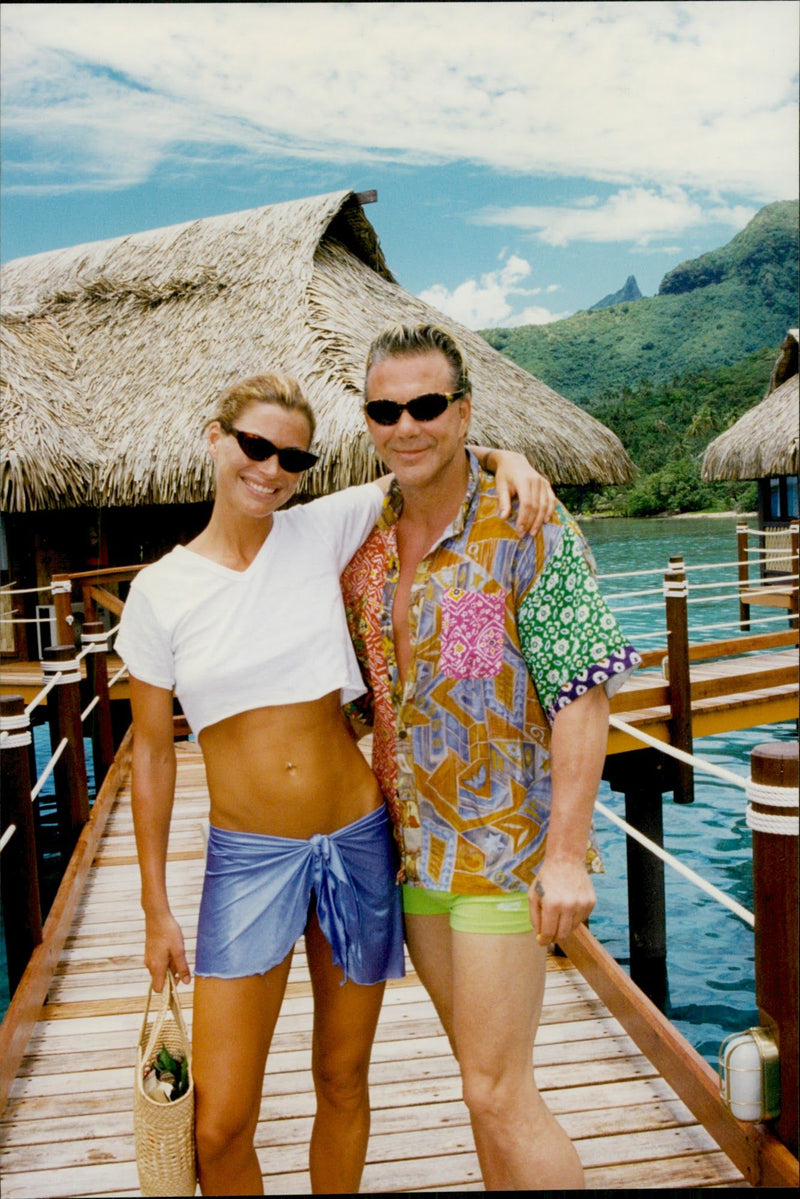 Mickey Rourke with his wife CarrÃ© Otis during their vacation in Tahiti. - Vintage Photograph