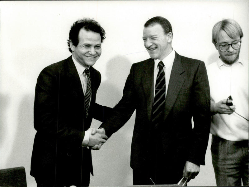 Fermentas CEO Refaat El-Sayed shakes hands with Volvo Pehr G. Gyllenhammar - Vintage Photograph