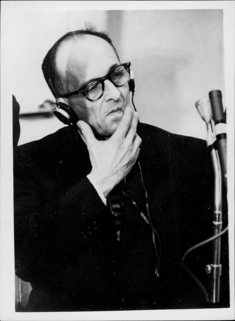 Nazi Adolf Eichmann photographed during the trial in Jerusalem where he was convicted of the death of war crimes and massacres during WWII. - Vintage Photograph