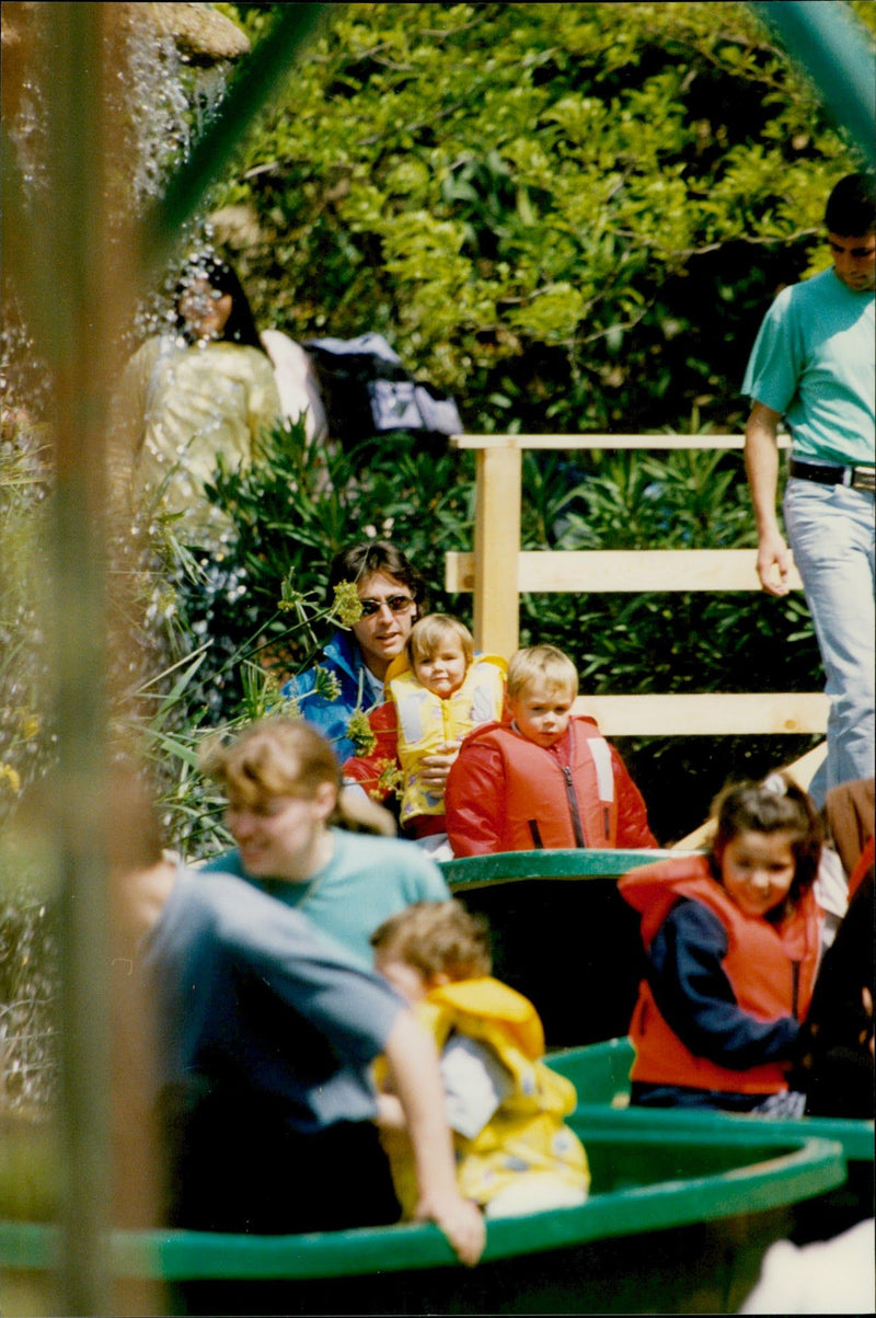 Daniel Ducruet is hanging out with the children Louis and Pauline at an animal and water park. - Vintage Photograph