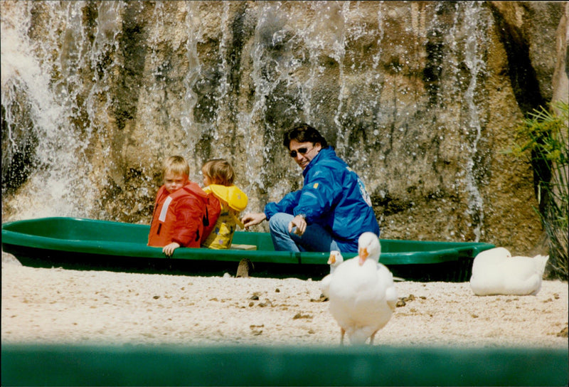 Daniel Ducruet is hanging out with the children Louis and Pauline at an animal and water park. - Vintage Photograph