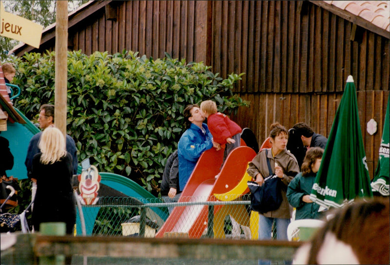 Daniel Ducruet is hanging out with the children Louis and Pauline at an animal and water park. - Vintage Photograph