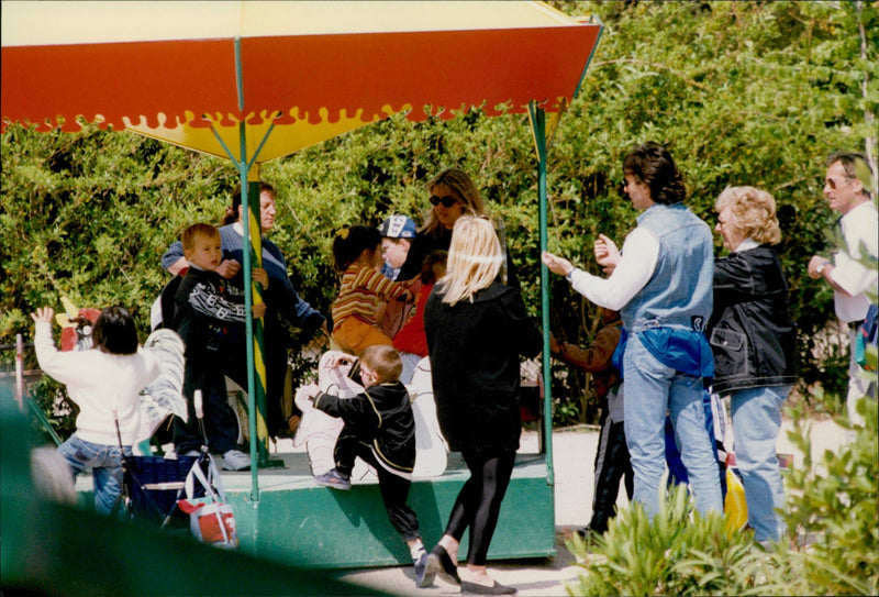 Daniel Ducruet is hanging out with the children Louis and Pauline at an animal and water park. - Vintage Photograph