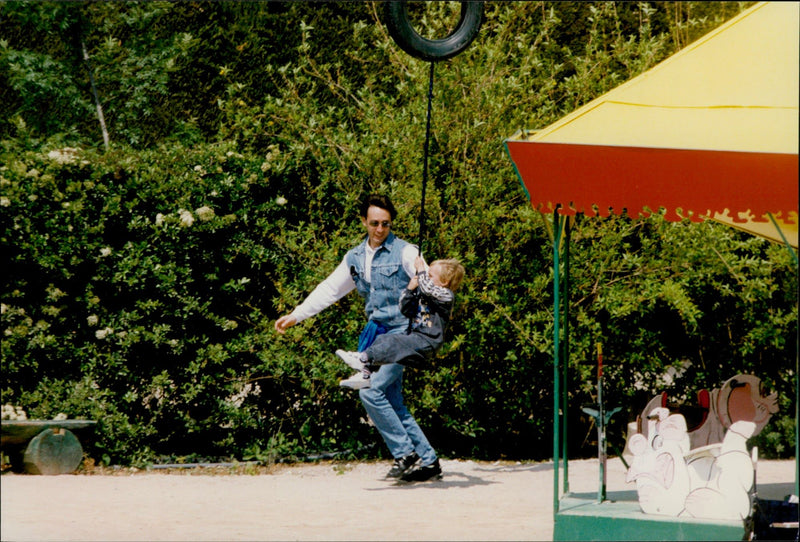 Daniel Ducruet is hanging out with the children Louis and Pauline at an animal and water park. - Vintage Photograph