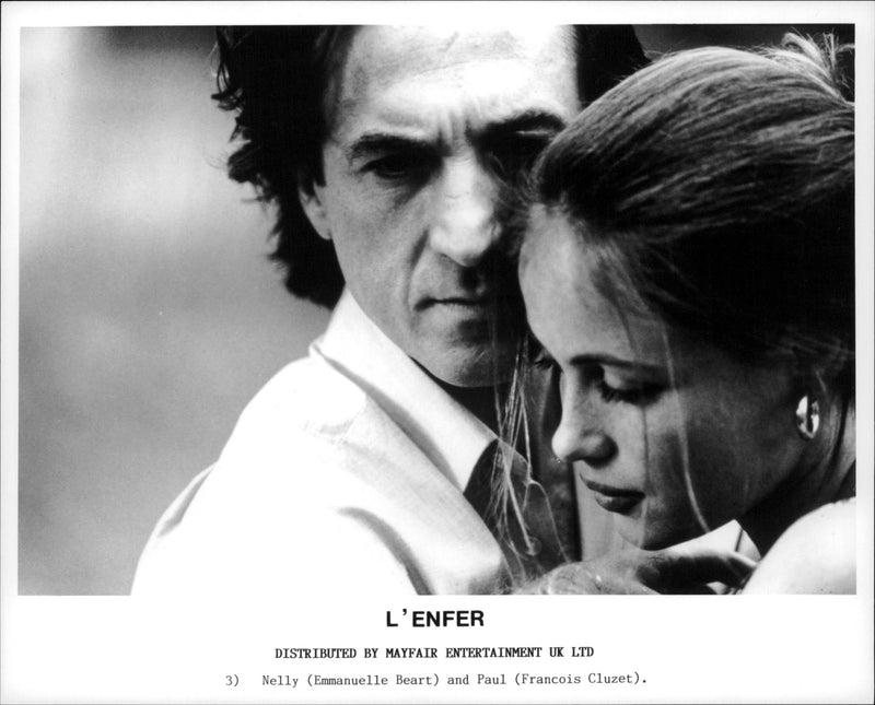 Couple Emmanuelle BÃ©art as Nelly  hugs FranÃ§ois Cluzet as Paul Prieur in 1994 Hell movie. - Vintage Photograph