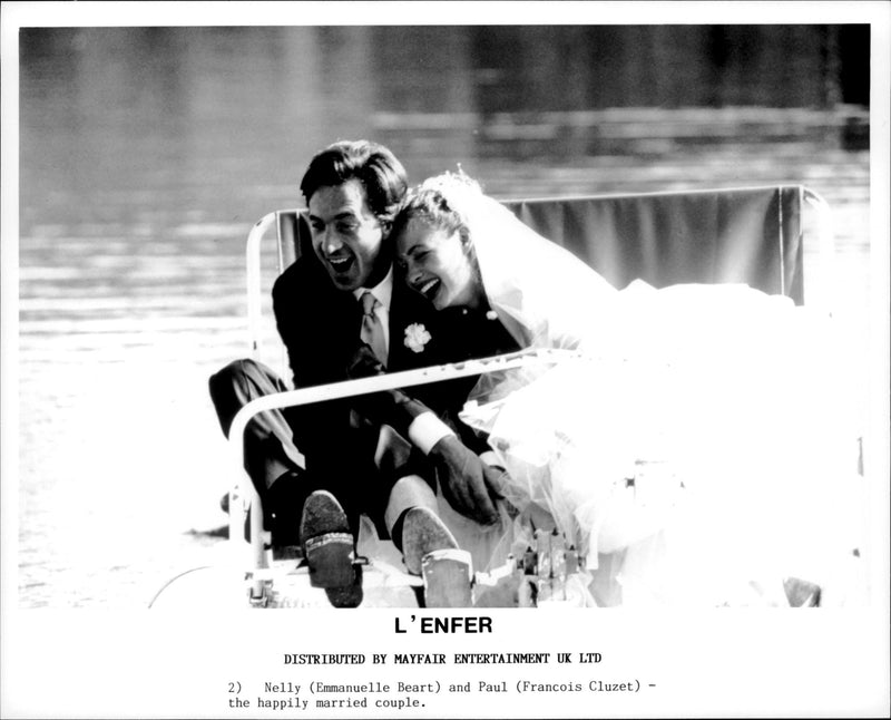 This picture shows Nelly (Emmanuelle Beart) and Paul (Francois Cluzet) the happily married couple in the film L'Enfer. - Vintage Photograph