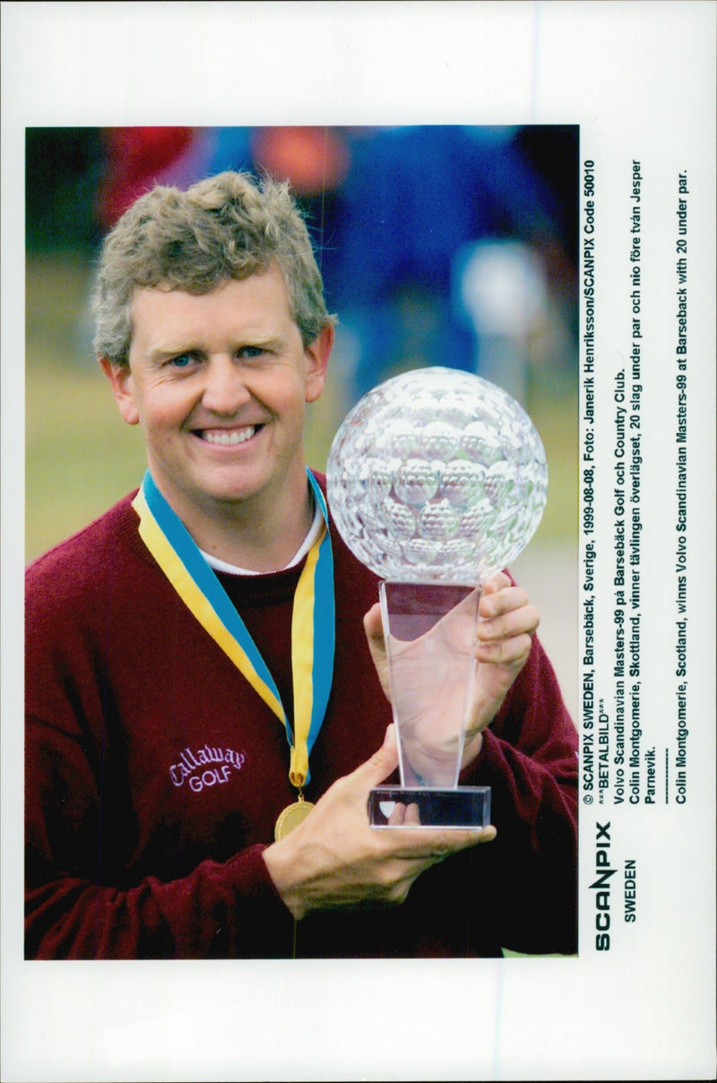 Golf player Colin Montgomerie with the trophy after the win in Volvo Scandinavian Masters 1999 - Vintage Photograph