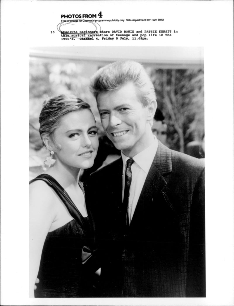 David Bowie and Patsy Kensit in the film "Absolute Beginners", 1986. - Vintage Photograph