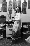 Poet Adia Hmeleva, in the kitchen in the three-room apartment, shared by six people. Hmeleva and her husband fled later to the west. - Vintage Photograph