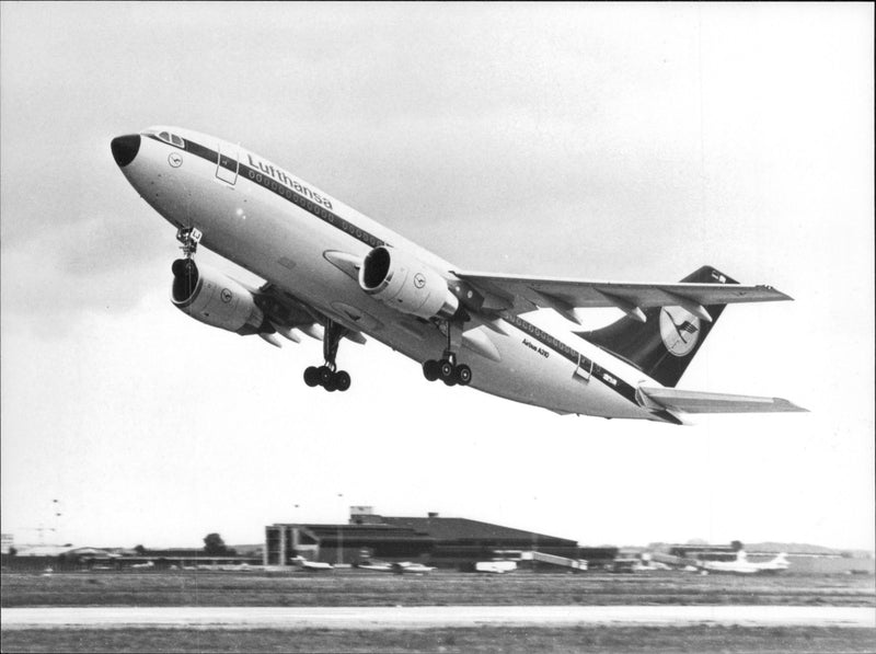 One of Lufthansa Airbus A310-202 in the air. - Vintage Photograph