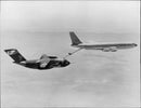 Trial flight with refueling planes in the air. - Vintage Photograph