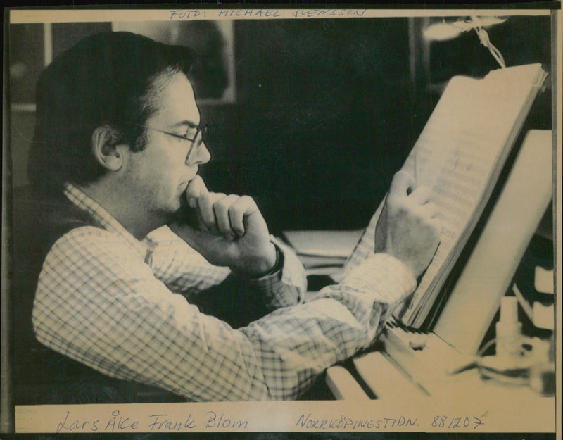 Lars-Ãke Franke-Blom sits and writes music to an opera about 20th century boxer star Harry Persson - Vintage Photograph