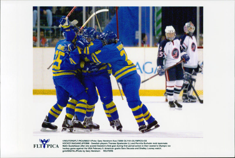 The Swedish Damland team in ice hockey celebrates Therese SjÃ¶landers&