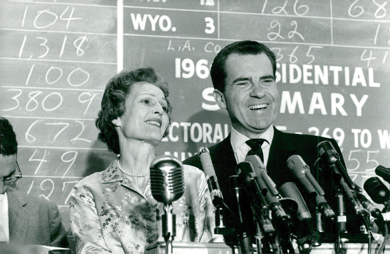 US Vice President Richard Nixon and his wife Pat look optimistic at counting the votes in the presidential election - Vintage Photograph