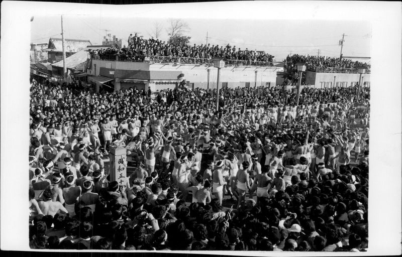 Hadaka Matsuri (Nude Festival) is held at Ohkunitama-jinja Place in Konomiya - Vintage Photograph