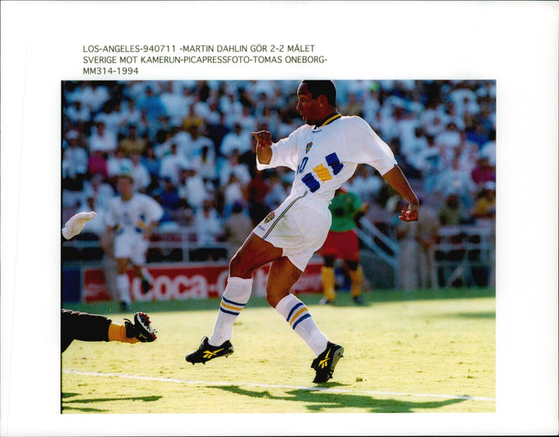 Football player Martin Dahlin makes the 2-2 goal during the match Sweden - Cameroon - Vintage Photograph