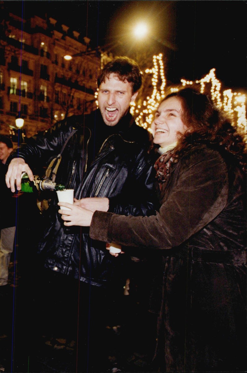 New Year's Eve at the Avenue Champs-Élysées. - Vintage Photograph