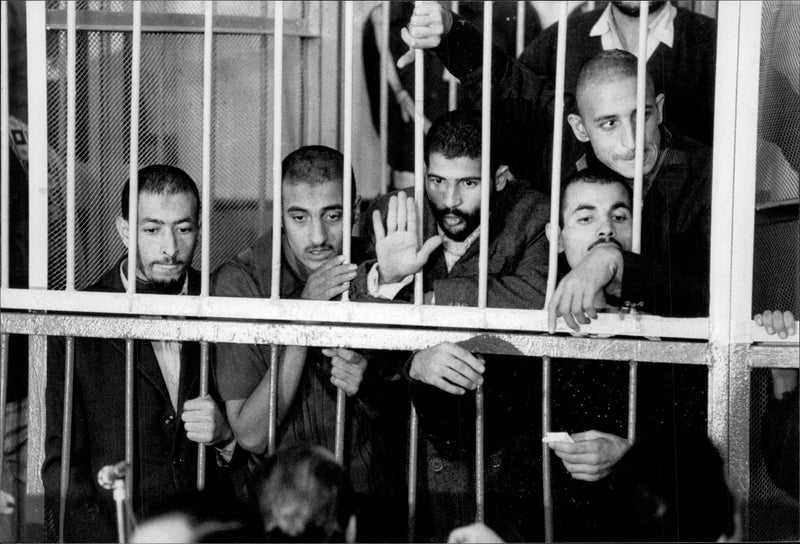 They arrested the murder of President Sadat in a steel cage during the trial - Vintage Photograph