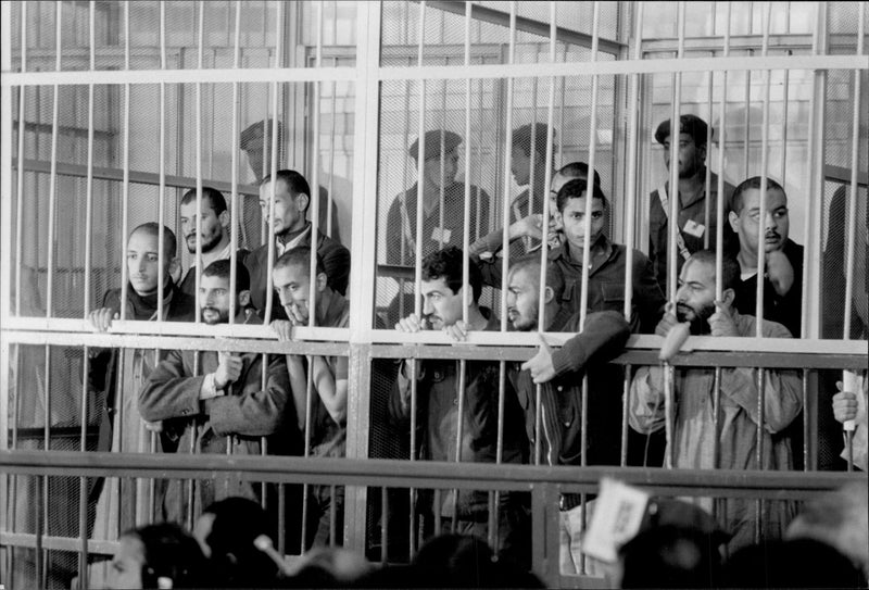 They arrested the murder of President Sadat in a steel cage during the trial - Vintage Photograph