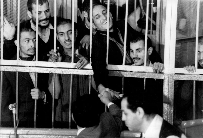 They arrested the murder of President Sadat in a steel cage during the trial - Vintage Photograph