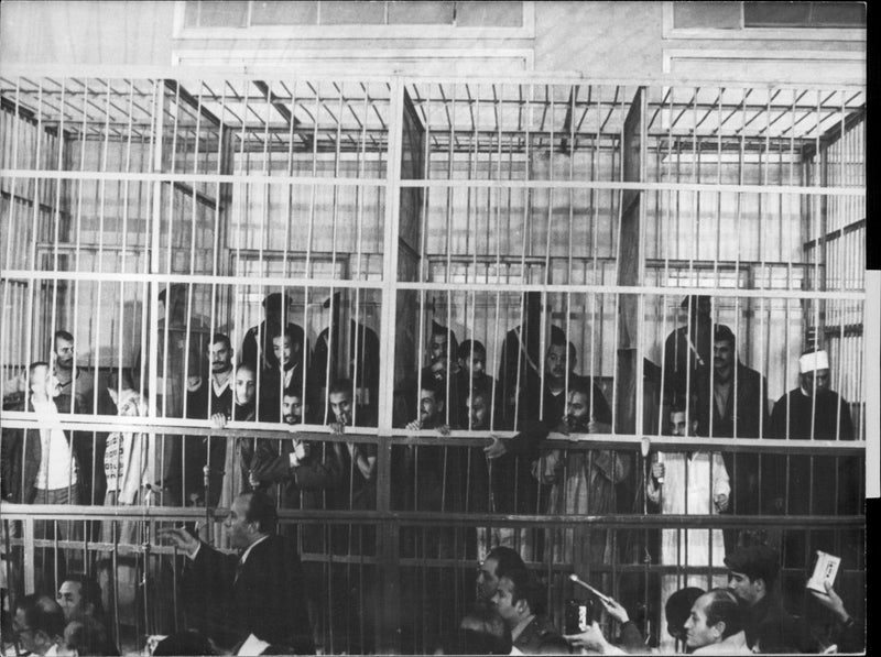 They arrested the murder of President Sadat in a steel cage during the trial - Vintage Photograph