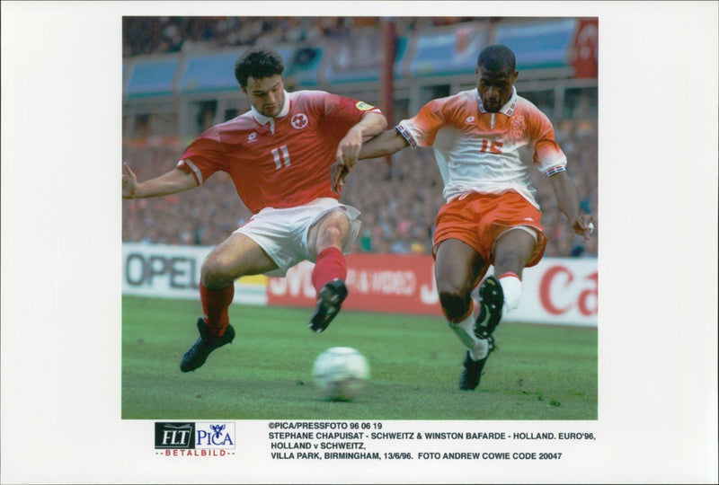 Football player StÃ©phane Chapuisat in close combat during the match against Holland - Vintage Photograph