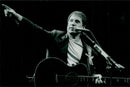 Paul Simon appears in the Globe - Vintage Photograph