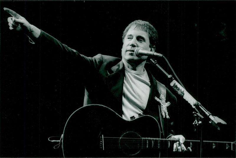 Paul Simon appears in the Globe - Vintage Photograph
