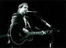 Paul Simon appears in the Globe - Vintage Photograph