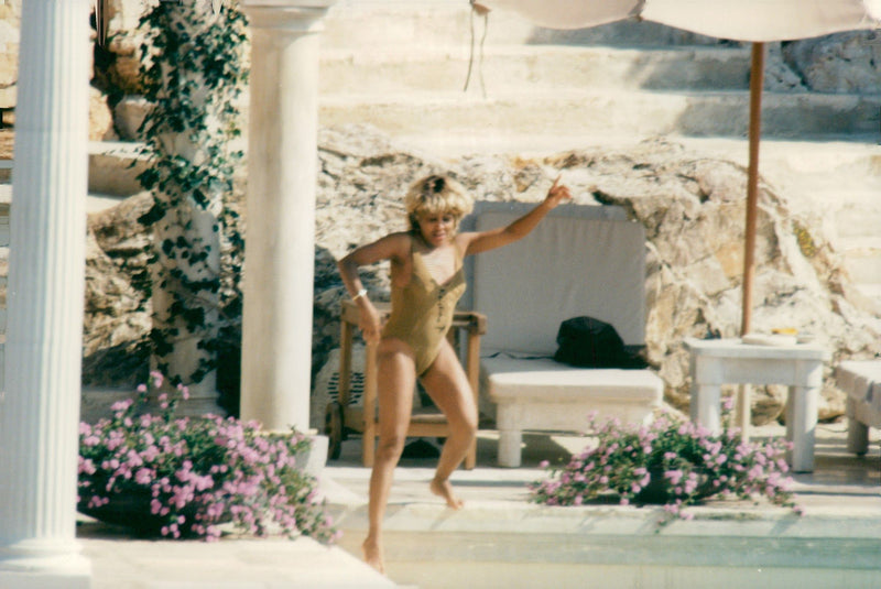 Tina Turner by the pool at his luxury villa in southern France - Vintage Photograph