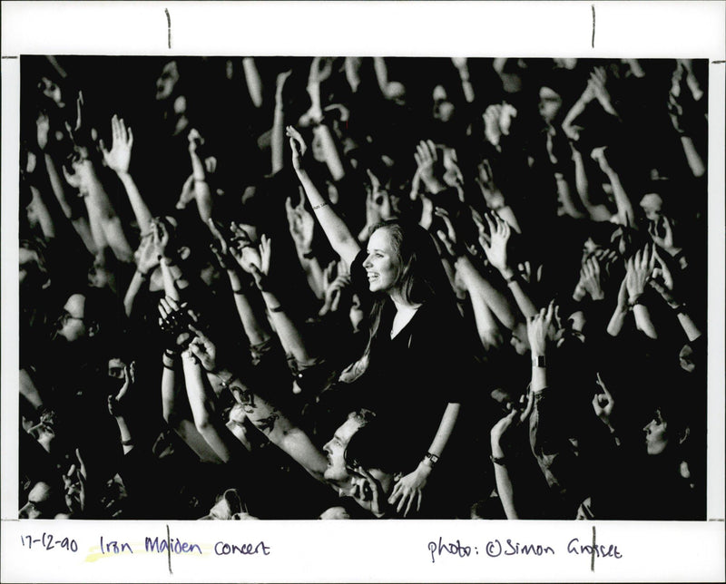 People gathered in the Iron Maiden Concert. - Vintage Photograph